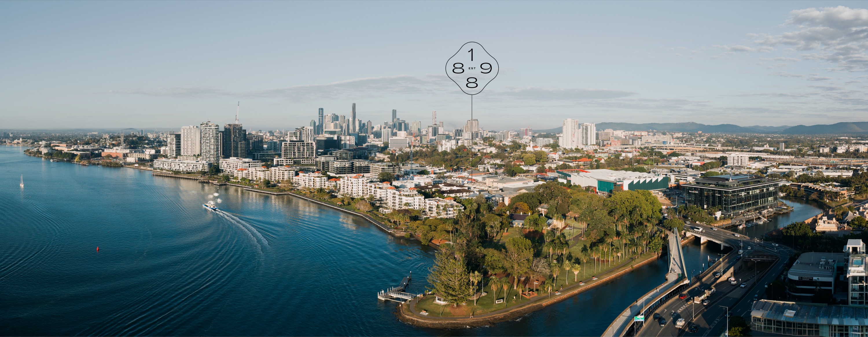 Aerial view over Newstead and the Brisbane River towards the city