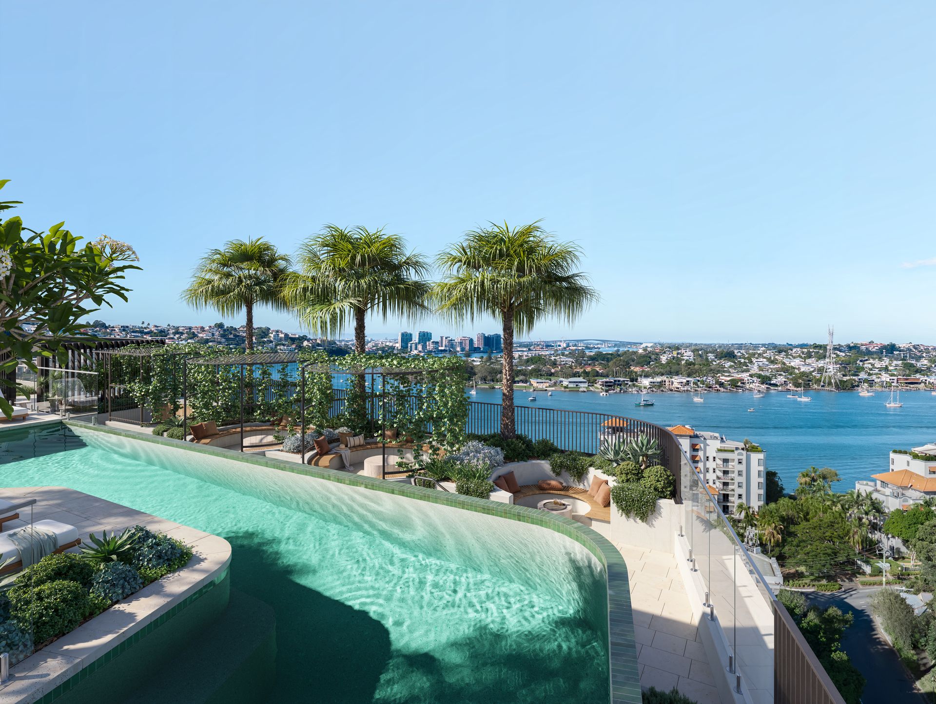 Rooftop amenity terrace with palms and pool overlooking the Brisbane River